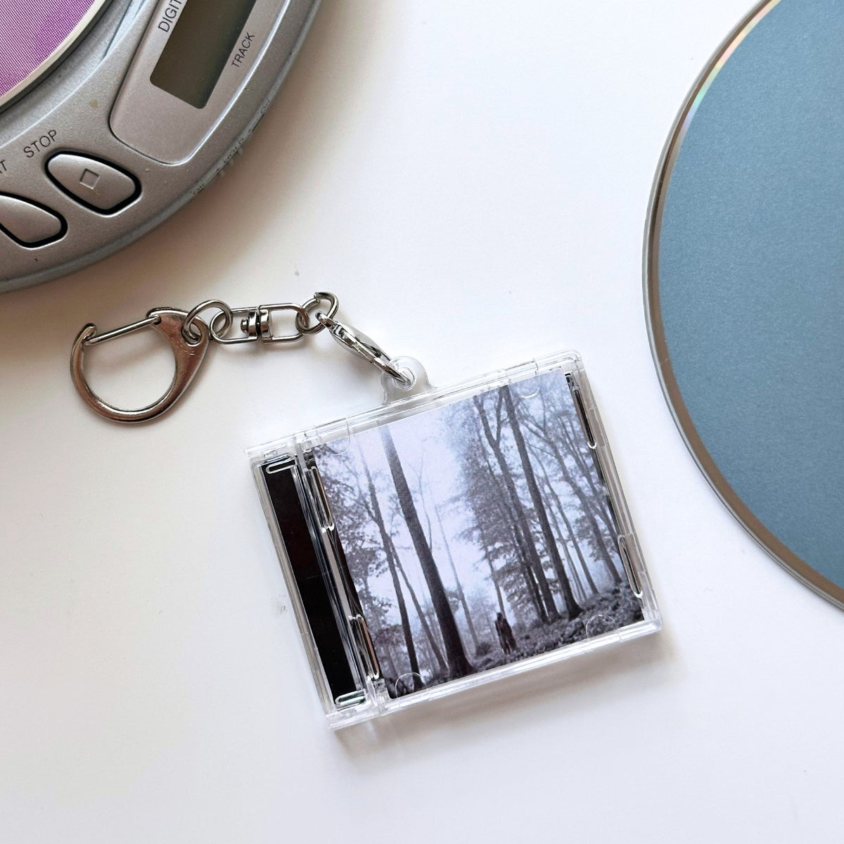 'Hit Clips' Mini CD Case Keychain - Taylor Folklore